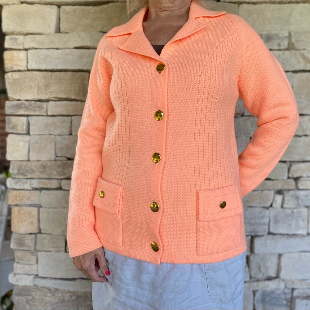 Vintage Montgomery Ward Cardigan as adorned with gold buttons.